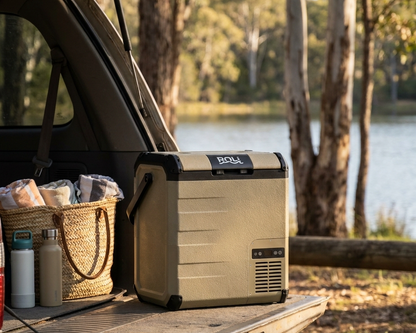 ROLi Roam 23L portable fridge set up on a car tailgate